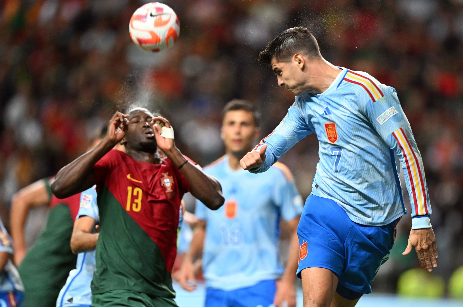 Danilo Pereira (L) vies with Alvaro Morata during the UEFA Nations League match between Portugal and Spain, at the Municipal Stadium in Braga, Portugal, Sept. 27, 2022. (AFP Photo)