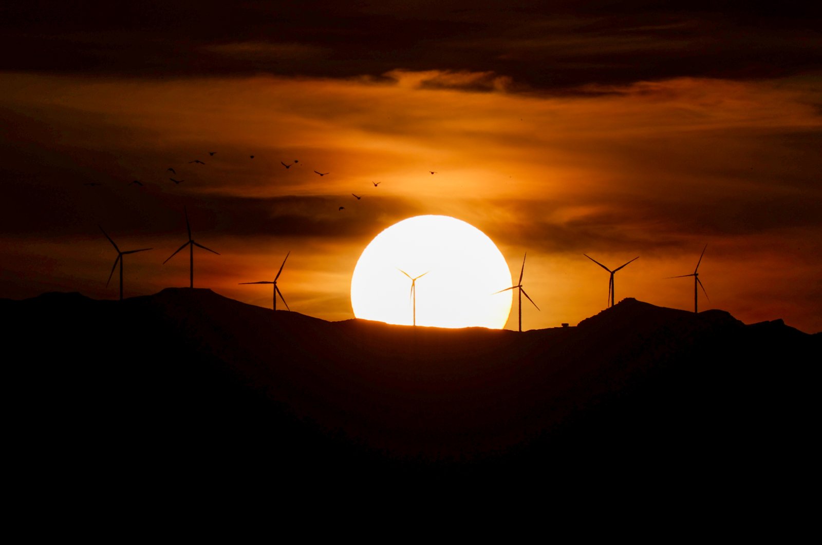 Wind turbines are seen during sundown in the Gevaş district of eastern Van province, Türkiye, March 6, 2021. (AA Photo)
