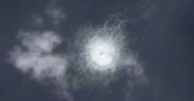 This satellite photo from Planet Labs PBC shows a gas leak on the Nord Stream 2 gas pipeline off the coast of the island of Bornholm, Denmark, Sept. 26, 2022. (Planet Labs PBC via AP)