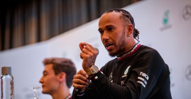 Hamilton (R) and George Russell (L) attend the announcement of a multiyear renewal Mercedes- AMG F1 and PETRONAS Title and Technical Partnership event, Kuala Lumpur, Malaysia, Sept. 28, 2022. (AA Photo)