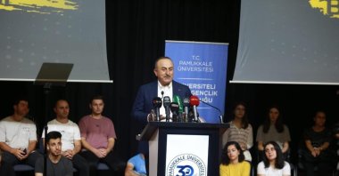Foreign Minister Mevlüt Çavuşoğlu speaks at a youth gathering at the Pamukkale University, Sept. 29, 2022. (IHA Photo)