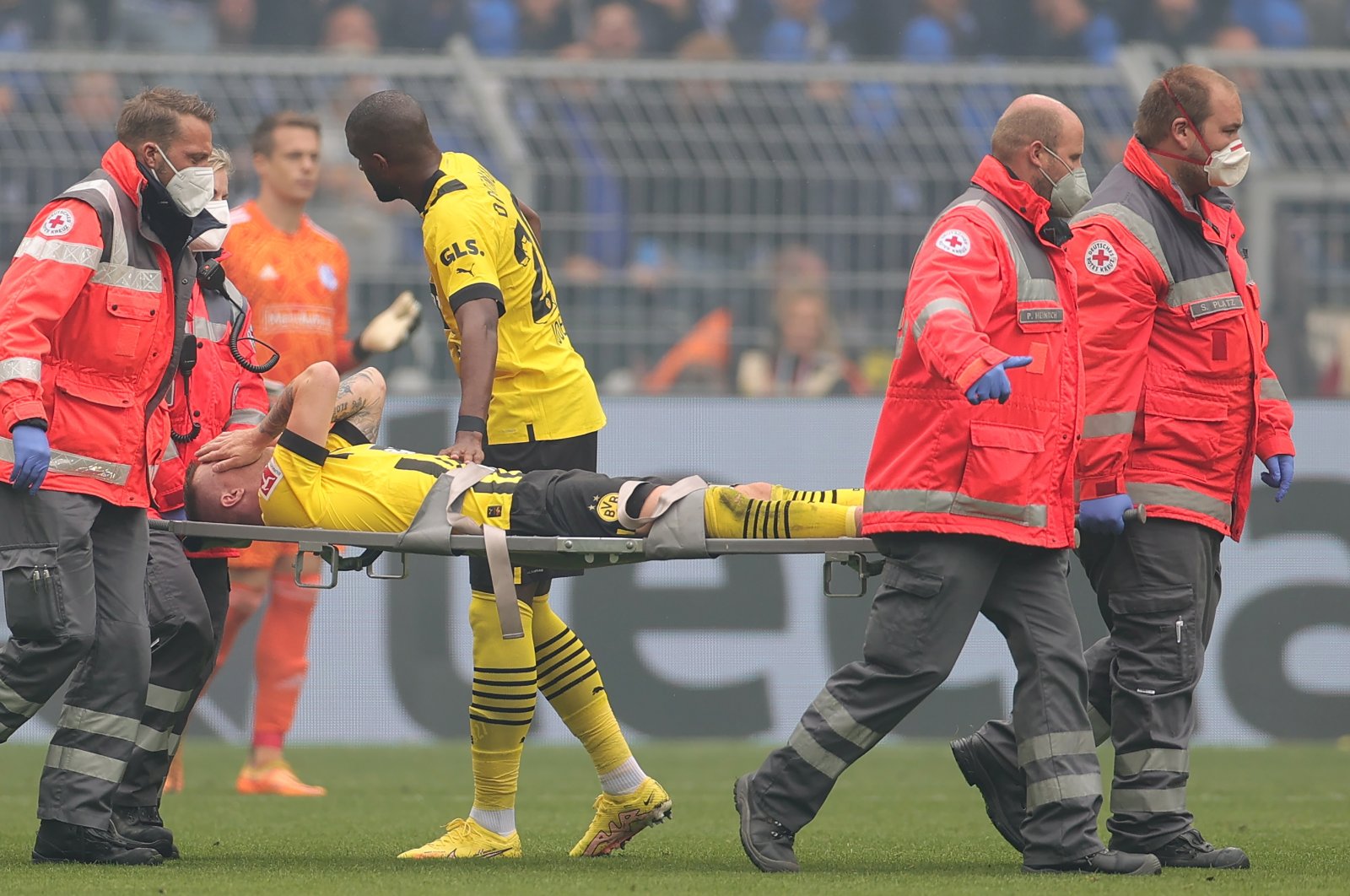 Injured Dortmund&#039;s Marco Reus is taken off the pitch in the German Bundesliga match between Borussia Dortmund and Schalke 04, Dortmund, Germany, Sept. 17, 2022. (EPA Photo)