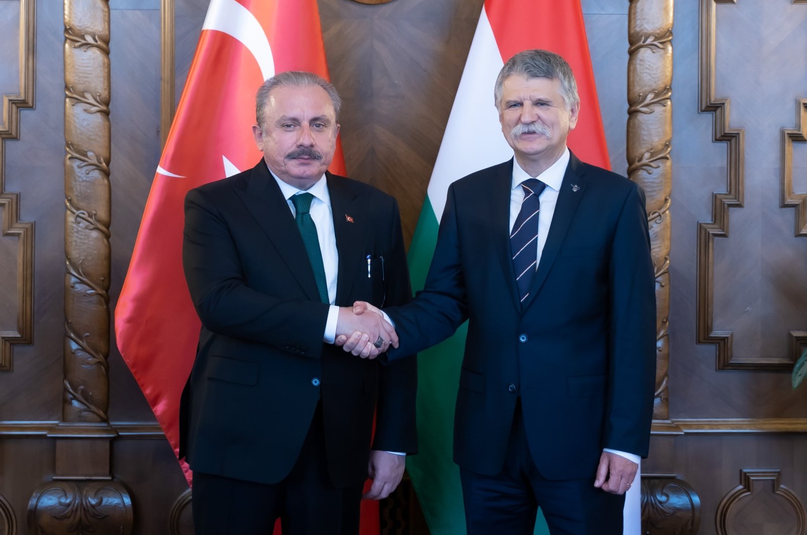 Turkish Parliament Speaker Mustafa Şentop (L) meets with his Hungarian counterpart Laszlo Köver (R) in Budapest, Hungary, Sept. 29, 2022. (DHA Photo)