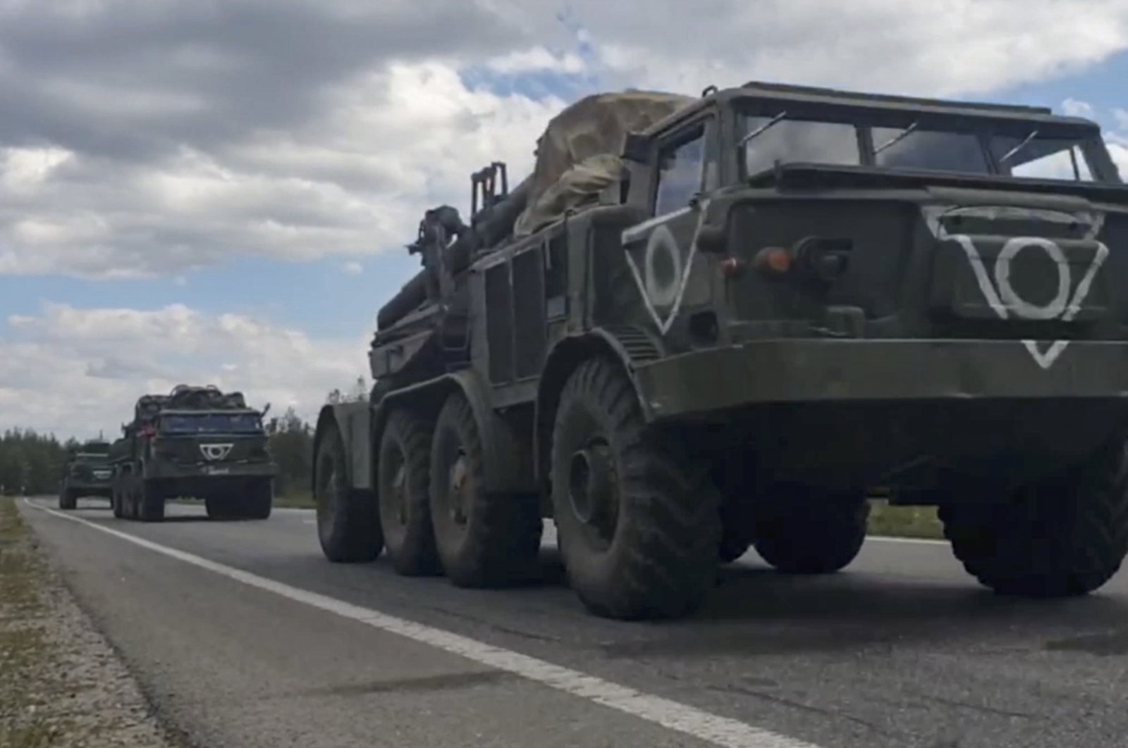 A still image taken from a handout video provided by the Russian Defence Ministry press service shows Russian military vehicles moving in the Kharkiv region, Ukraine, Sept. 9, 2022. (EPA)