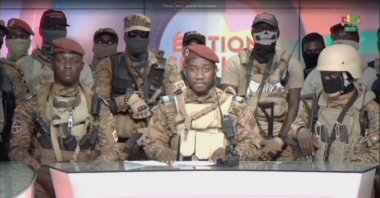 A still image from a video shows Kiswensida Farouk Aziz Sorgho announcing on television that army Capt. Ibrahim Traore has ousted Burkina Faso's military leader Paul-Henri Damiba and dissolved the government and Constitution, Ouagadougou, Burkina Faso, Sept. 30, 2022, in this still image obtained from a video. (Radio Television Burkina Faso handout via Reuters) 