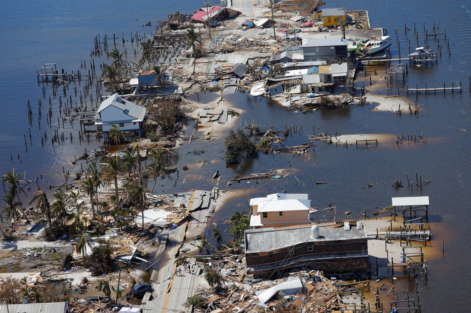 Destroyed homes and businesses on Pine Island, Florida are seen from a U.S. Army National Guard Blackhawk helicopter, after Hurricane Ian caused widespread destruction on Pine Island, Florida, U.S., Oct. 1, 2022. (Reuters Photo)