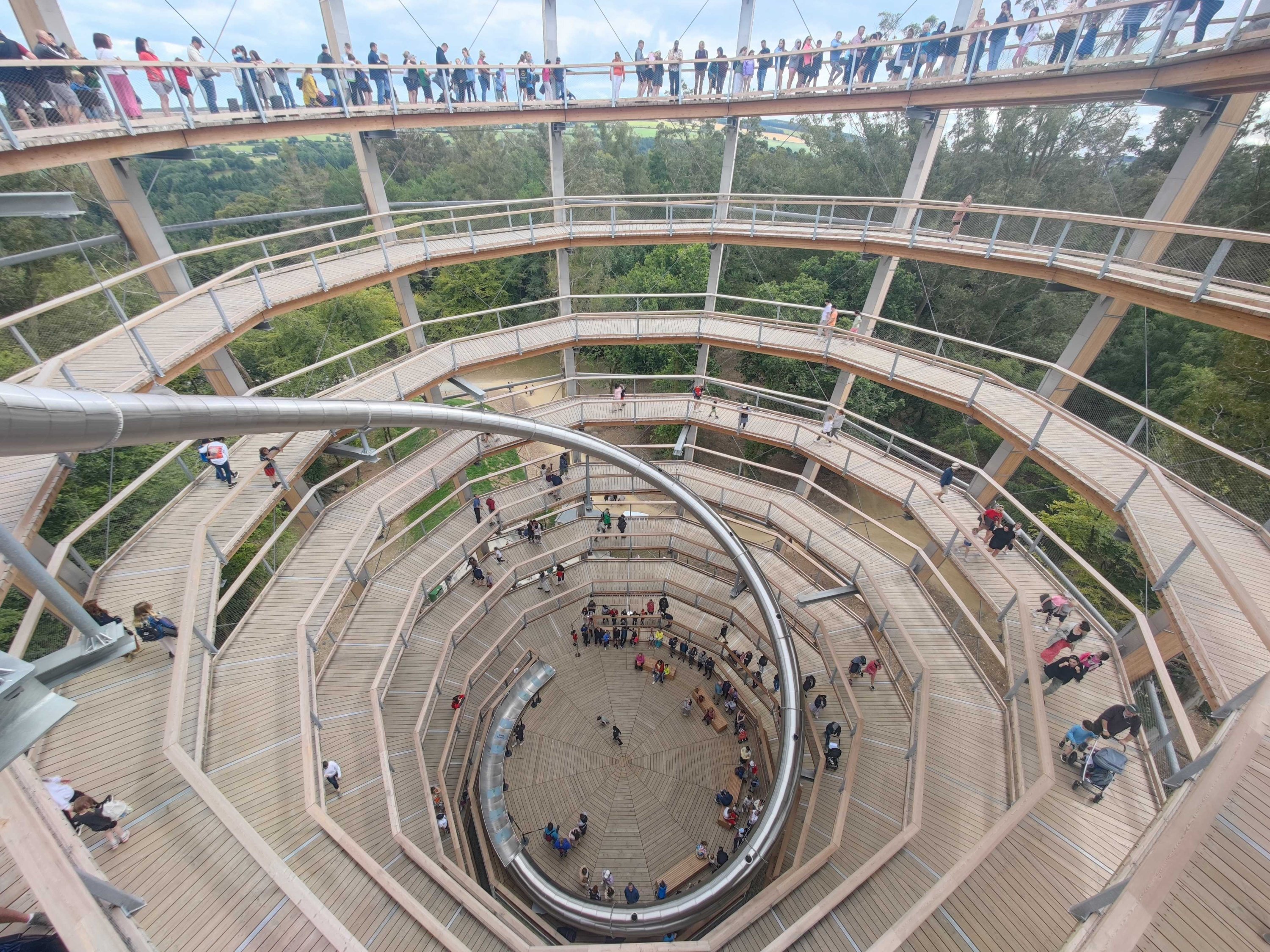 The highlight of the treetop walk is the panorama tower at the end: Visitors walk up a large spiral structure before sliding back down through a long tunnel slide, Dublin, Ireland, July 30, 2022. (dpa Photo)