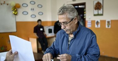 A man casts his ballot at a polling station during Bosnia-Herzegovina&#039;s parliamentary elections, Sofia, Oct. 2, 2022. (AFP Photo)