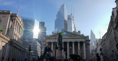 A man cycles past the Bank of England and the financial district in London, U.K., Sept. 30, 2022. (Reuters Photo)