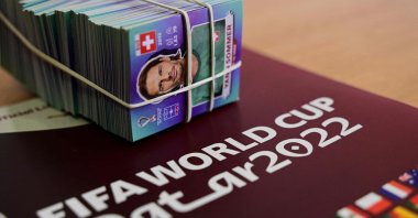 View of a Panini World Cup football album and stickers in Santiago, Chile, Sept. 23, 2022. (AFP Photo)