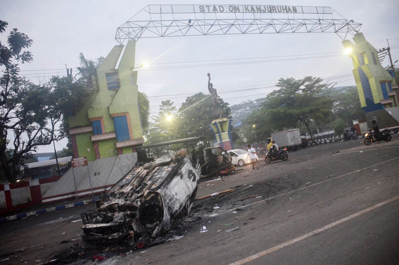 A torched car outside Kanjuruhan stadium in Malang, East Java, Indonesia, Oct. 2, 2022. (AFP Photo)