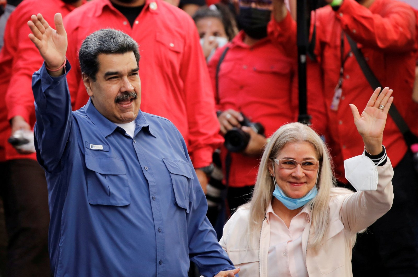 Venezuela&#039;s President Nicolas Maduro and his wife Cilia Flores wave to the crowd during a government rally to mark Youth Day, in Caracas, Venezuela, Feb. 12, 2022. (Reuters Photo)