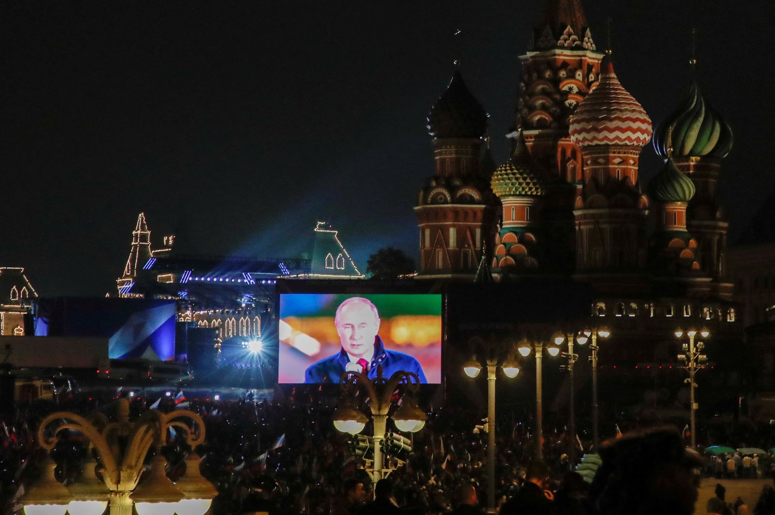 Russian President Vladimir Putin is seen on a screen during the broadcast of a concert marking the declared annexation of the Russian-controlled territories of Ukraine&#039;s four regions, after holding what Russian authorities called referendums in the occupied areas of Ukraine that were condemned by Kyiv and governments worldwide, near St. Basil&#039;s Cathedral and Red Square in central Moscow, Russia, Sept. 30, 2022. (Reuters Photo)
