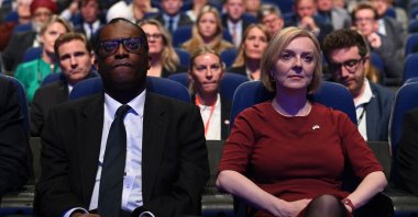 British Chancellor of the Exchequer Kwasi Kwarteng (L) and British Prime Minister Liz Truss attend the Conservative Party annual conference at the International Convention Center in Birmingham, central Britain, Oct. 2, 2022. (AP Photo)