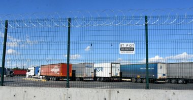Trucks at a rest stop encircled with barbed wire, in Edirne, northwestern Türkiye, Sept. 30, 2022. (DHA PHOTO) 