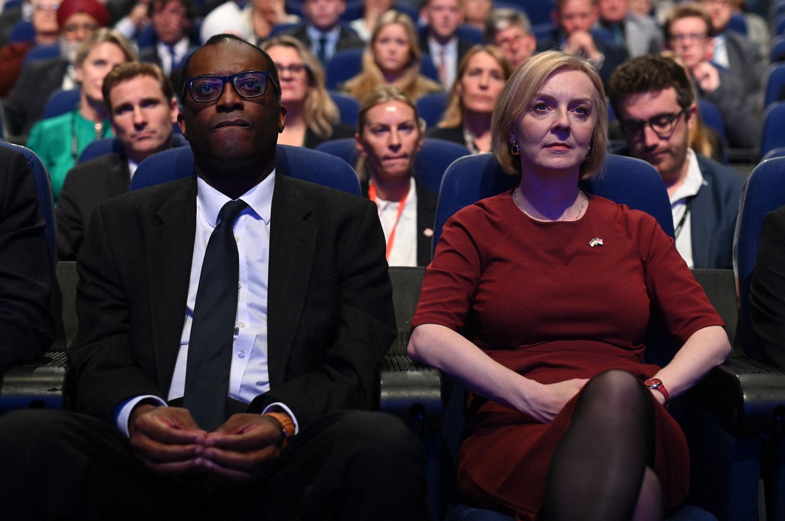 British Chancellor of the Exchequer Kwasi Kwarteng (L) and British Prime Minister Liz Truss attend the Conservative Party annual conference at the International Convention Center in Birmingham, central Britain, Oct. 2, 2022. (AP Photo)