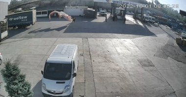 Screenshot of security camera footage of Adem Keskin landing at the factory, in Bursa, northwestern Türkiye, Oct. 1, 2022. (İHA PHOTO) 