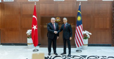 Türkiye's Parliament Speaker Mustafa Şentop (L) meets with his Malaysian counterpart Azhar Azizan Harun (R) in Kuala Lampur, Malaysia, Oct. 4, 2022. (AA Photo)