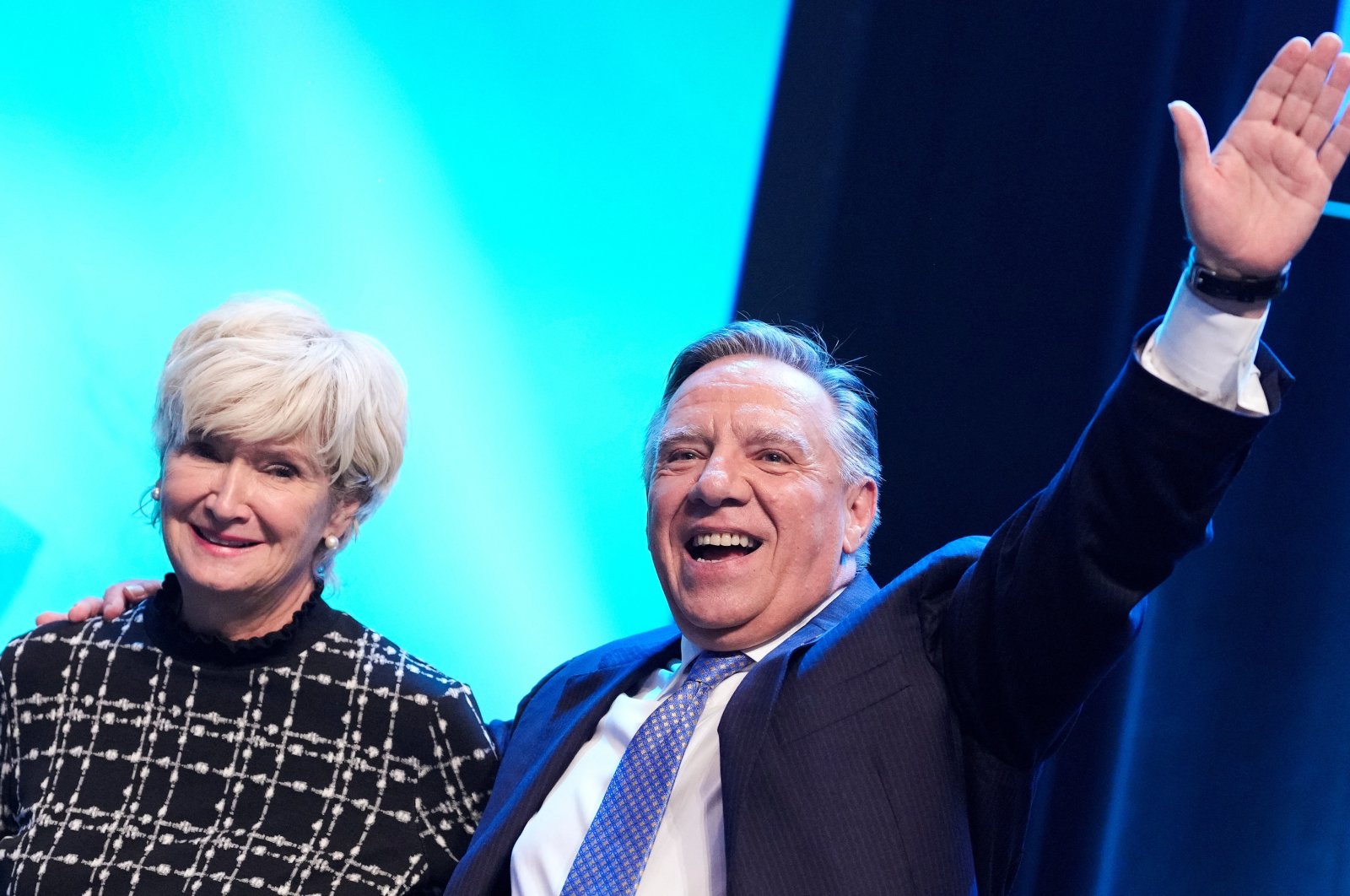 Quebec Premier Francois Legault waves next to his wife Isabelle Brais at an election night rally, Quebec City, Quebec, Canada, Oct. 3, 2022. (REUTERS Photo)