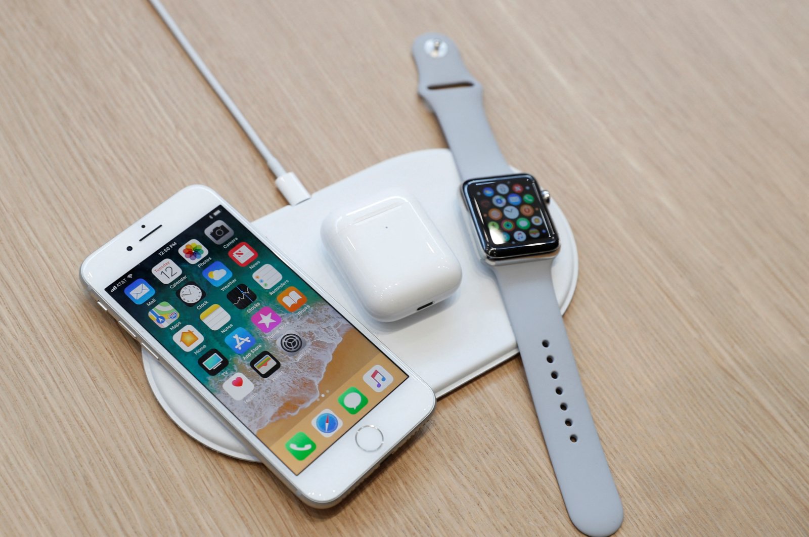 An AirPower wireless charger is displayed along with other products during an Apple launch event in Cupertino, California, U.S., Sept.12, 2017. (Reuters File Photo)