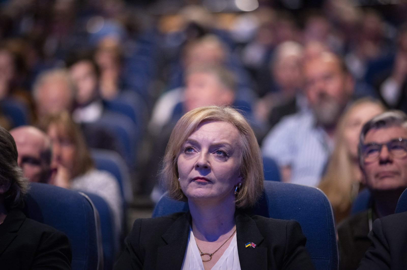 British Prime Minister Liz Truss (C) listens to Britain&#039;s Chancellor of the Exchequer Kwasi Kwarteng&#039;s keynote speech at the Conservative Party Conference in Birmingham, Britain, Oct. 3, 2022. (EPA Photo)