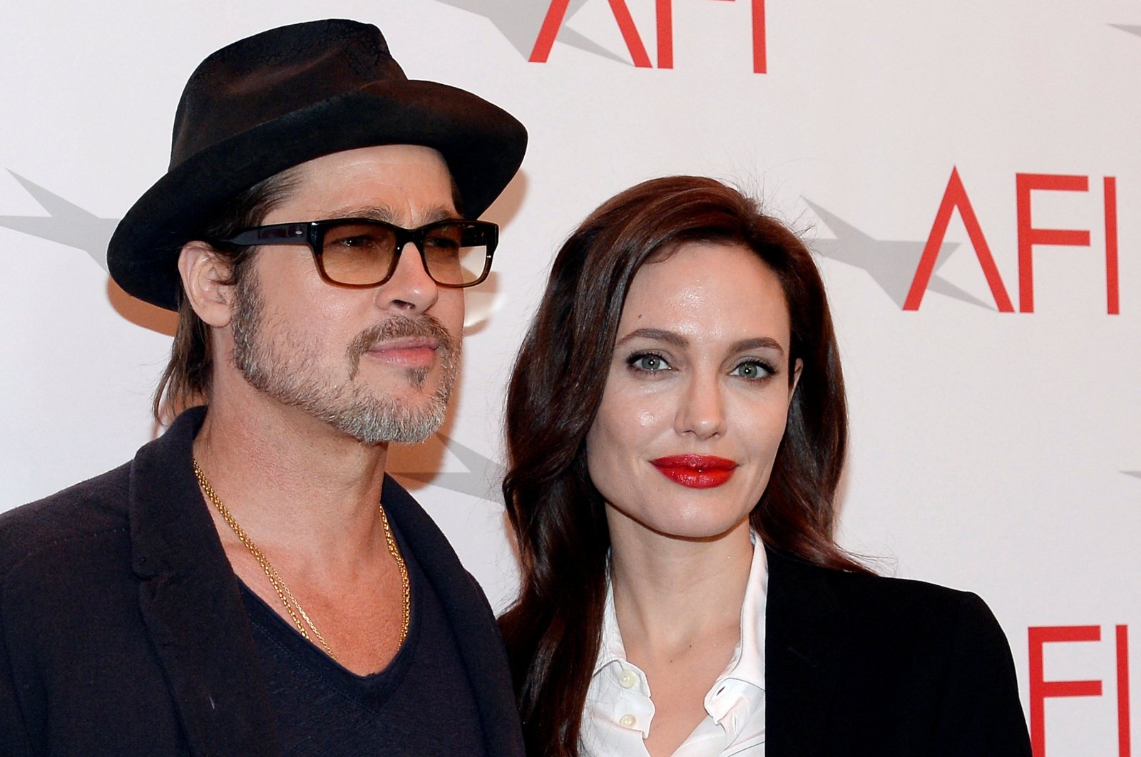 Brad Pitt and Angelina Jolie pose at the AFI Awards honoring excellence in film and television in Beverly Hills, California, U.S., Jan. 9, 2015. (Reuters File Photo)