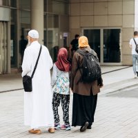A family of tourists or migrants walking along the street in Leipzig, Germany, Sept. 6, 2018. (Shutterstock File Photo)