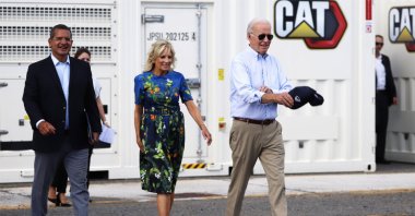 U.S. President Joe Biden (R) walks with first lady Jill Biden (C) and the governor of Puerto Rico, Pedro Pierluisi, during an official visit to inspect damage from Hurricane Fiona. Ponce, Puerto Rico, Oct. 3, 2022. (EPA Photo)