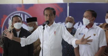 Indonesian President Joko Widodo speaks to the media during a press conference at Kanjuruhan Stadium, where a soccer stampede killed more than 100 people, Malang, East Java, Indonesia, Oct. 5, 2022.  (AP Photo)