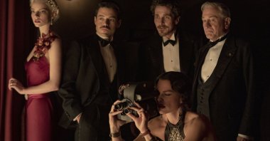 This image released by 20th Century Studios shows, clockwise from left, Anya Taylor-Joy, Rami Malek, Christian Bale, Robert De Niro and Margot Robbie in a scene from &quot;Amsterdam.&quot; (AP Photo)