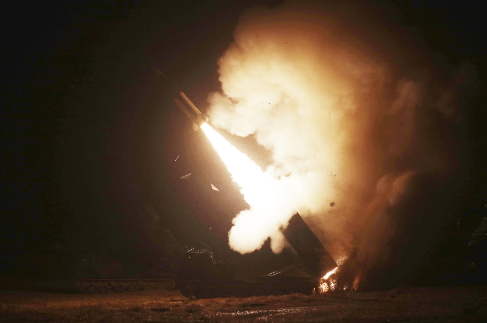 In this photo provided by the South Korean Defense Ministry, an Army Tactical Missile System (ATACMS) missile is fired during a joint military drill between the U.S. and South Korea at an undisclosed location in South Korea, Oct. 5, 2022. (AP Photo)