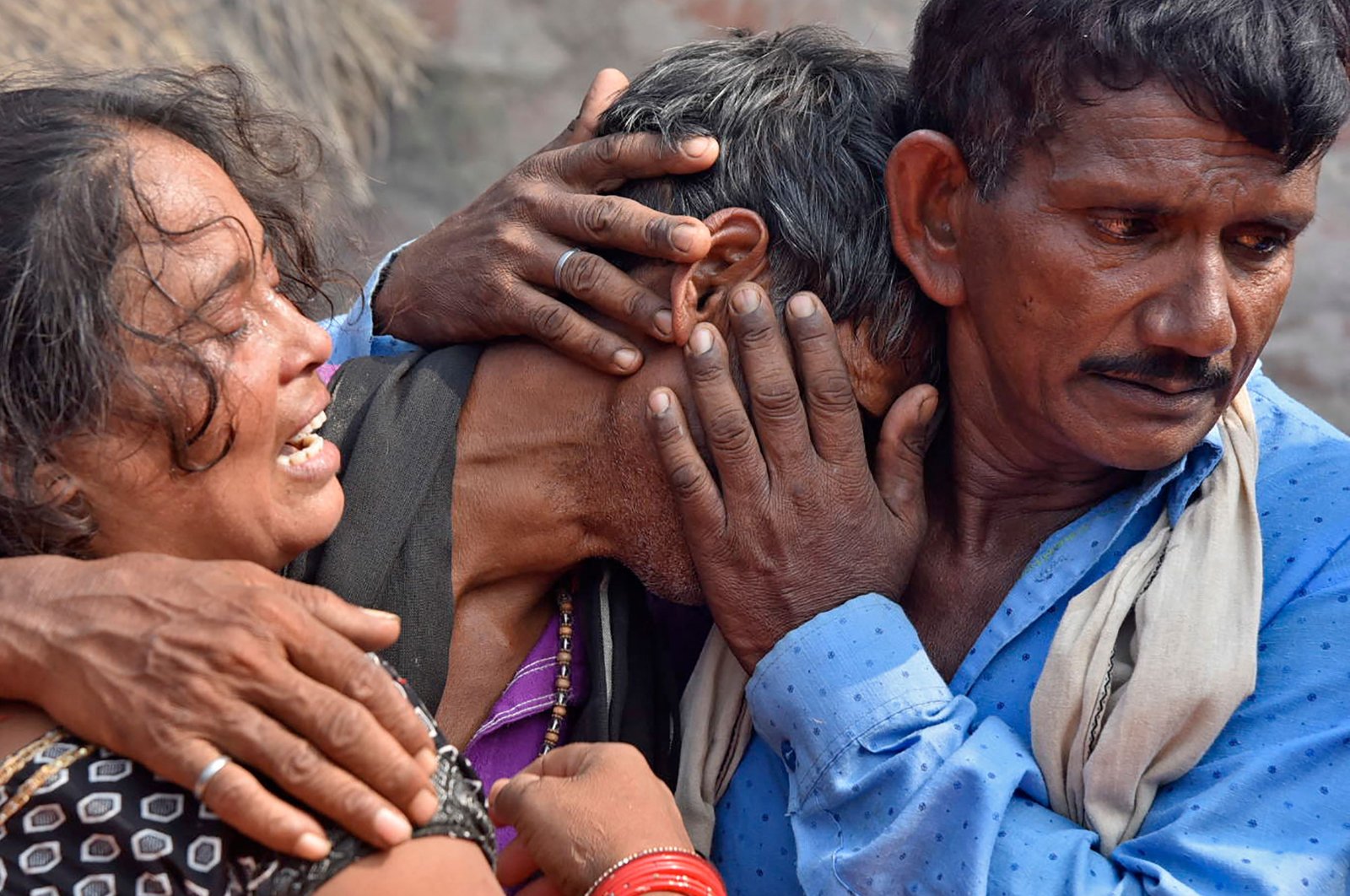 Villagers weep next to the bodies of their relatives who died in a road accident, Kanpur, India, Oct. 2, 2022. (AFP Photo)