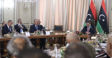 The leader of the Tripoli-based unity government and Prime Minister Abdul Hamid Mohammed Dbeibah (R) during a meeting with high-level Turkish delegation including Foreign Minister Mevlüt Çavuşoğlu (2nd L) and Defense Minister Hulusi Akar (L), in the capital Tripoli, Libya, Oct. 3, 2022. (AA Photo)