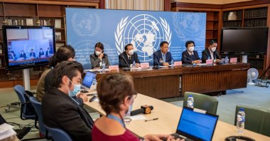 Director of the information office of China&#039;s Xinjiang region Xu Guixiang (3rd R) speaks during a press conference against a long-delayed U.N. report which warns of possible crimes against humanity in Xinjiang, on the sideline of the 51th Human Rights Council, in Geneva, Switzerland, Sept. 22, 2022. (AFP File Photo)