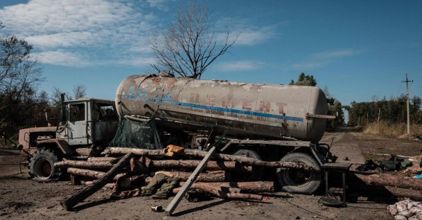 A destroyed oil truck, once used by Russian forces to block a road at a checkpoint during the occupation, is seen near the recently retaken town of Lyman in the Donetsk region, Ukraine, Oct. 6, 2022, amid the Russian invasion of Ukraine. (AFP Photo)