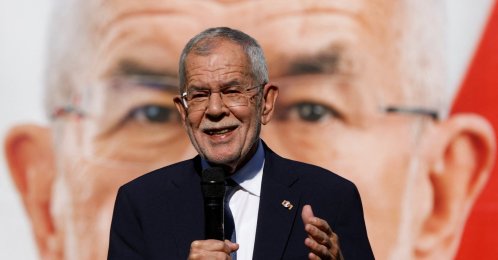 Austrian President Alexander Van der Bellen presents election campaign posters for upcoming presidential elections, Vienna, Austria, Sept. 23, 2022. (REUTERS Photo)