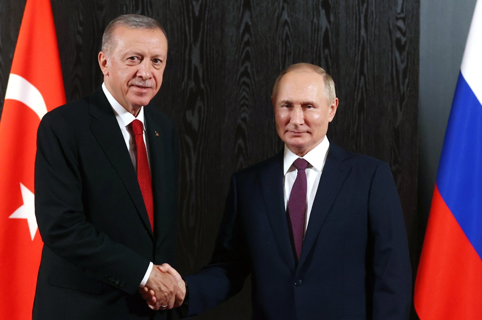 Russian President Vladimir Putin (R) and President Recep Tayyip Erdoğan pose for a photo prior to their talks on the sidelines of the Shanghai Cooperation Organisation (SCO) summit in Samarkand, Uzbekistan, Sept. 16, 2022. (AFP Photo)