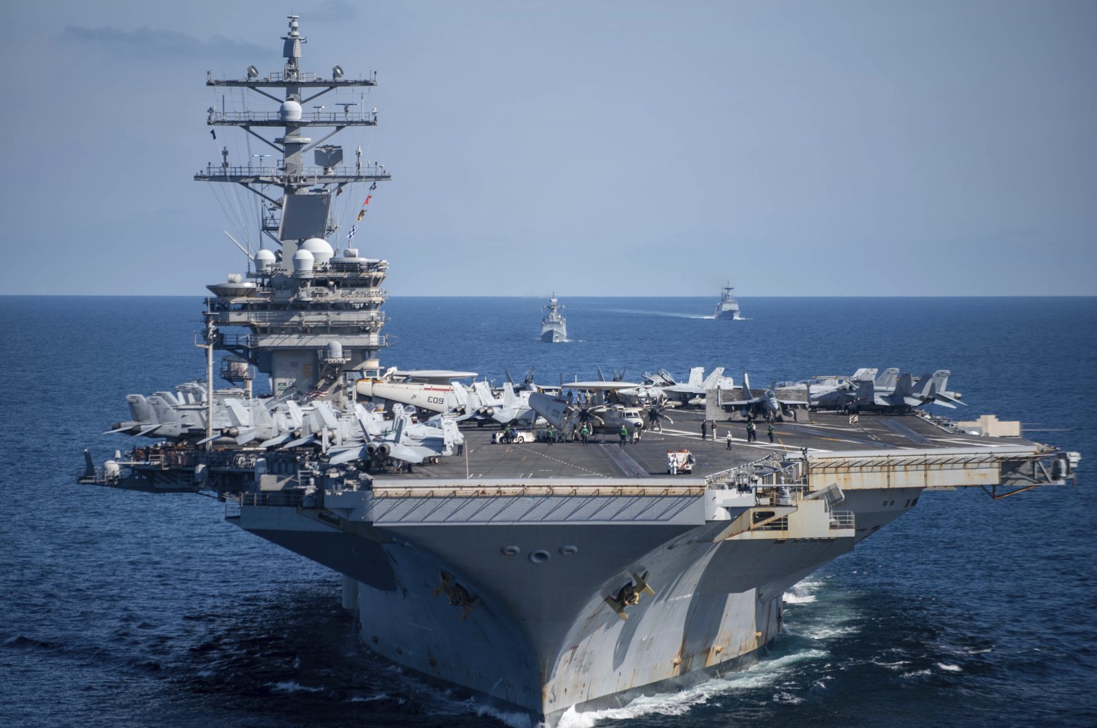The U.S. aircraft carrier USS Ronald Reagan participates with other U.S. and South Korean naval ships during the joint naval exercises between the United States and South Korea in waters off South Korea&#039;s eastern coast, Sept. 29, 2022. (South Korea Navy/Yonhap via AP)