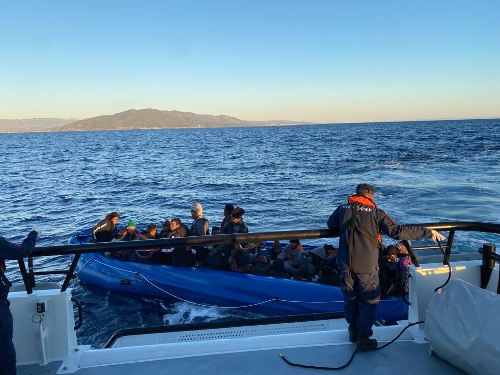 Turkish coast guard units rescue irregular migrants pushed back by Greece in the Aegean Sea, Oct. 4, 2022. (IHA Photo)
