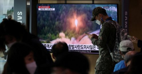 A South Korean soldier walks past a TV broadcasting a news report on North Korea firing a ballistic missile toward the sea off its east coast, in Seoul, South Korea, Sept. 25, 2022. (Reuters File Photo)
