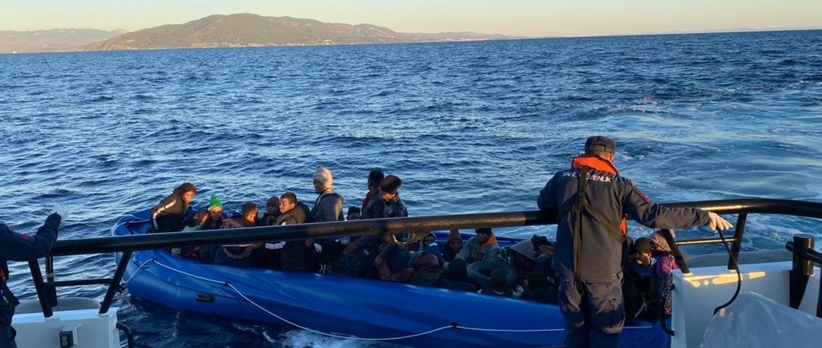 Turkish coast guard units rescue irregular migrants pushed back by Greece in the Aegean Sea, Oct. 4, 2022. (IHA Photo)