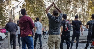 Protesters clash with police during a protest over the death of young Iranian woman Mahsa Amini, Tehran, Iran, Oct. 9, 2022. (EPA Photo)