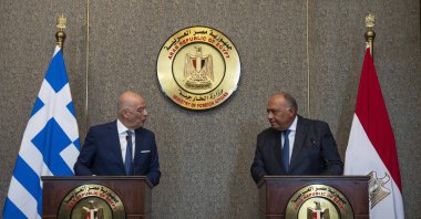 Greek Foreign Minister Nikos Dendias (L) and Egyptian Foreign Minister Sameh Shukry hold a joint press conference, at the foreign ministry headquarters in Cairo, Egypt, Oct. 9, 2022. (AP Photo)
