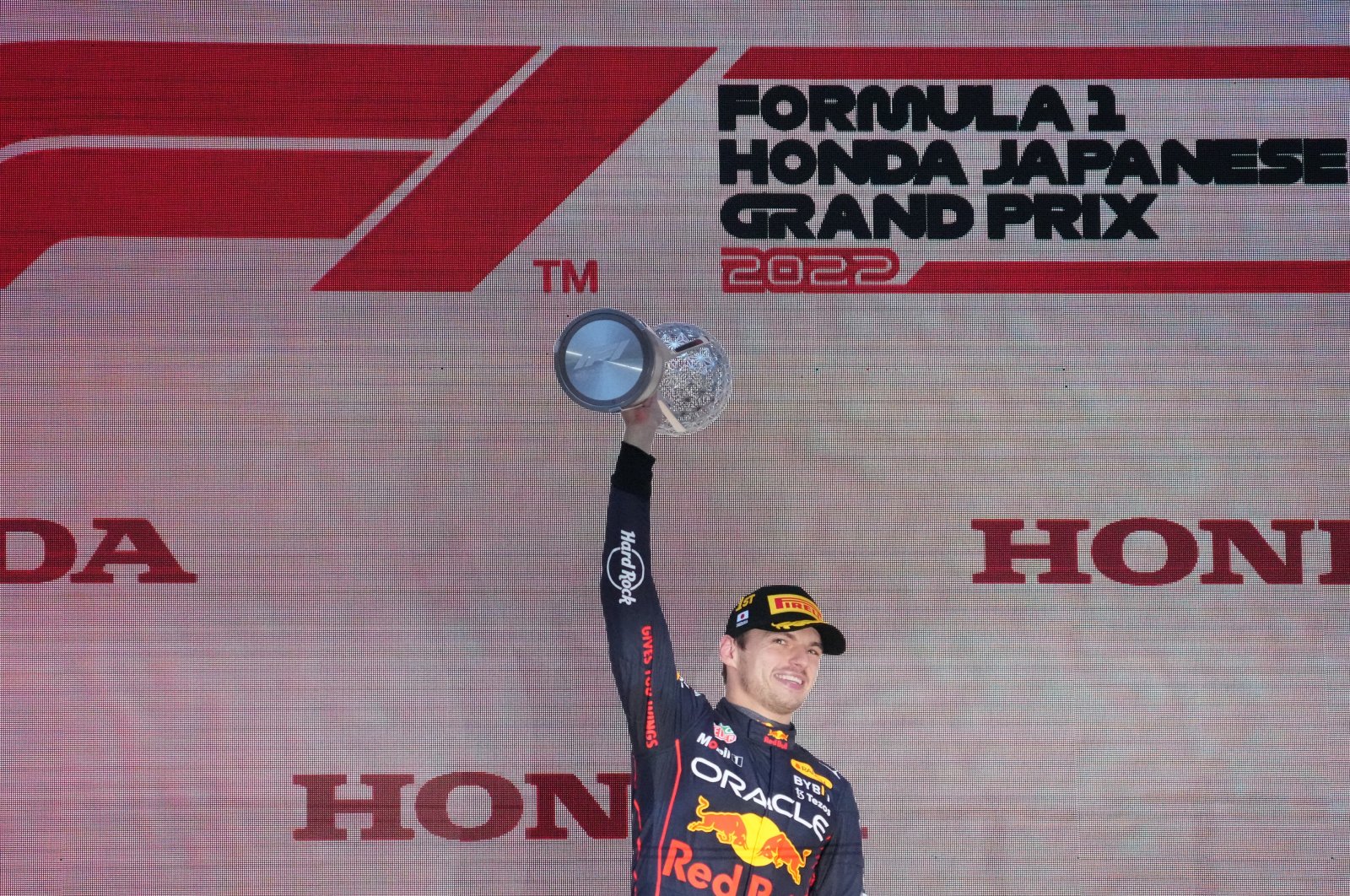 Red Bull driver Max Verstappen of the Netherlands holds aloft the trophy during the Japanese Formula One Grand Prix at the Suzuka Circuit in Suzuka, central Japan, Oct. 9, 2022. (AP Photo)