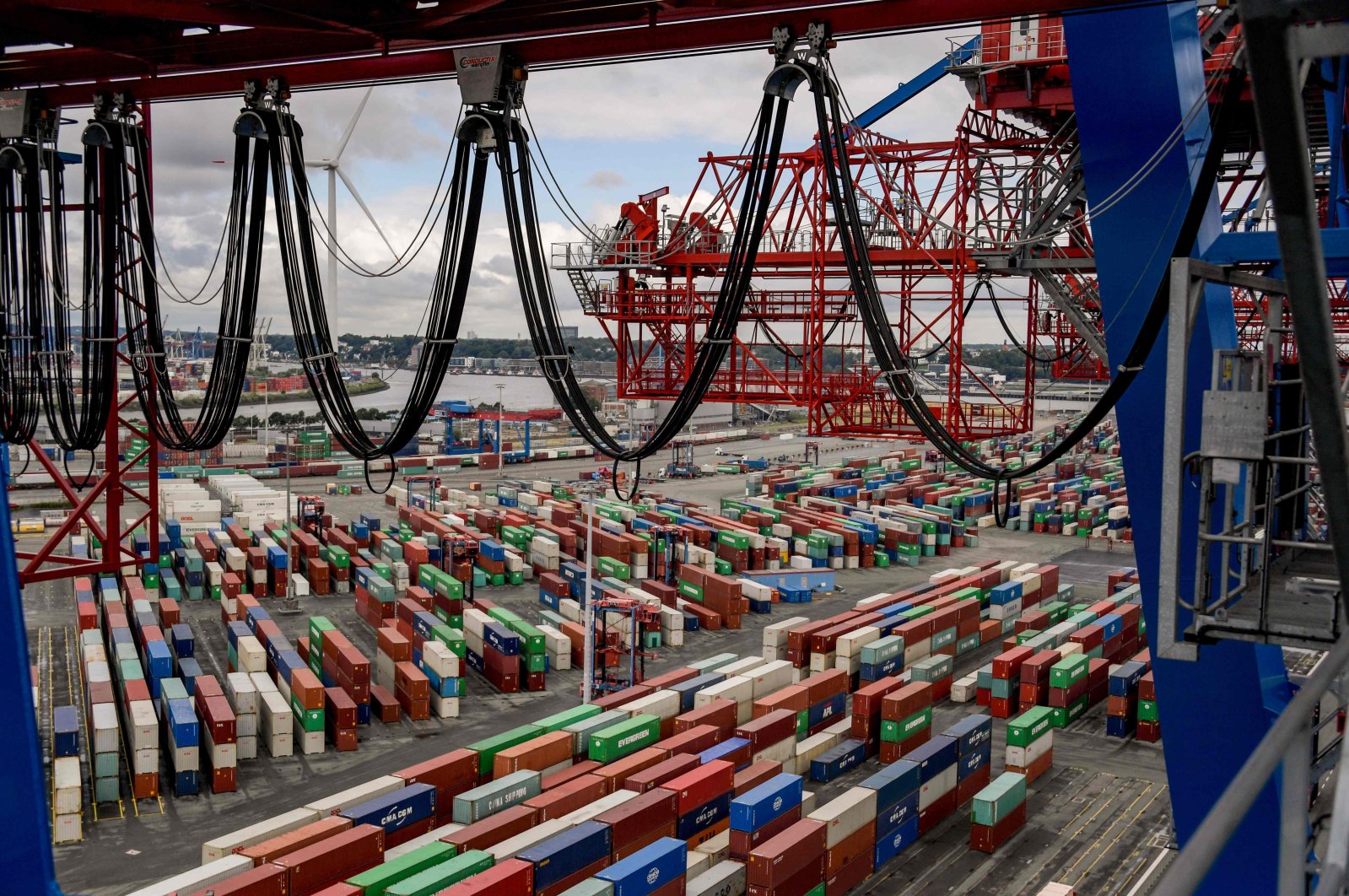 Containers are seen at the terminal of a port in Hamburg, northern Germany, July 10, 2018. (AFP Photo)