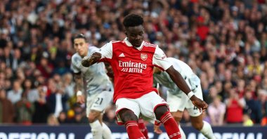 Arsenal's Bukayo Saka scores Arsenal's third goal from the penalty spot during a Premier League match between Arsenal and Liverpool at Emirates Stadium, London, Britain, Oct. 9, 2022. (REUTERS Photo)