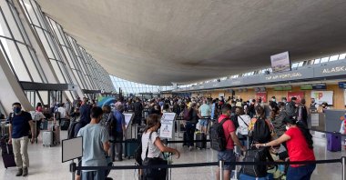 Passengers are seen at Dulles Washington International Airport (IAD) in Dulles, Virginia, U.S., Aug. 14, 2021. (AFP Photo)
