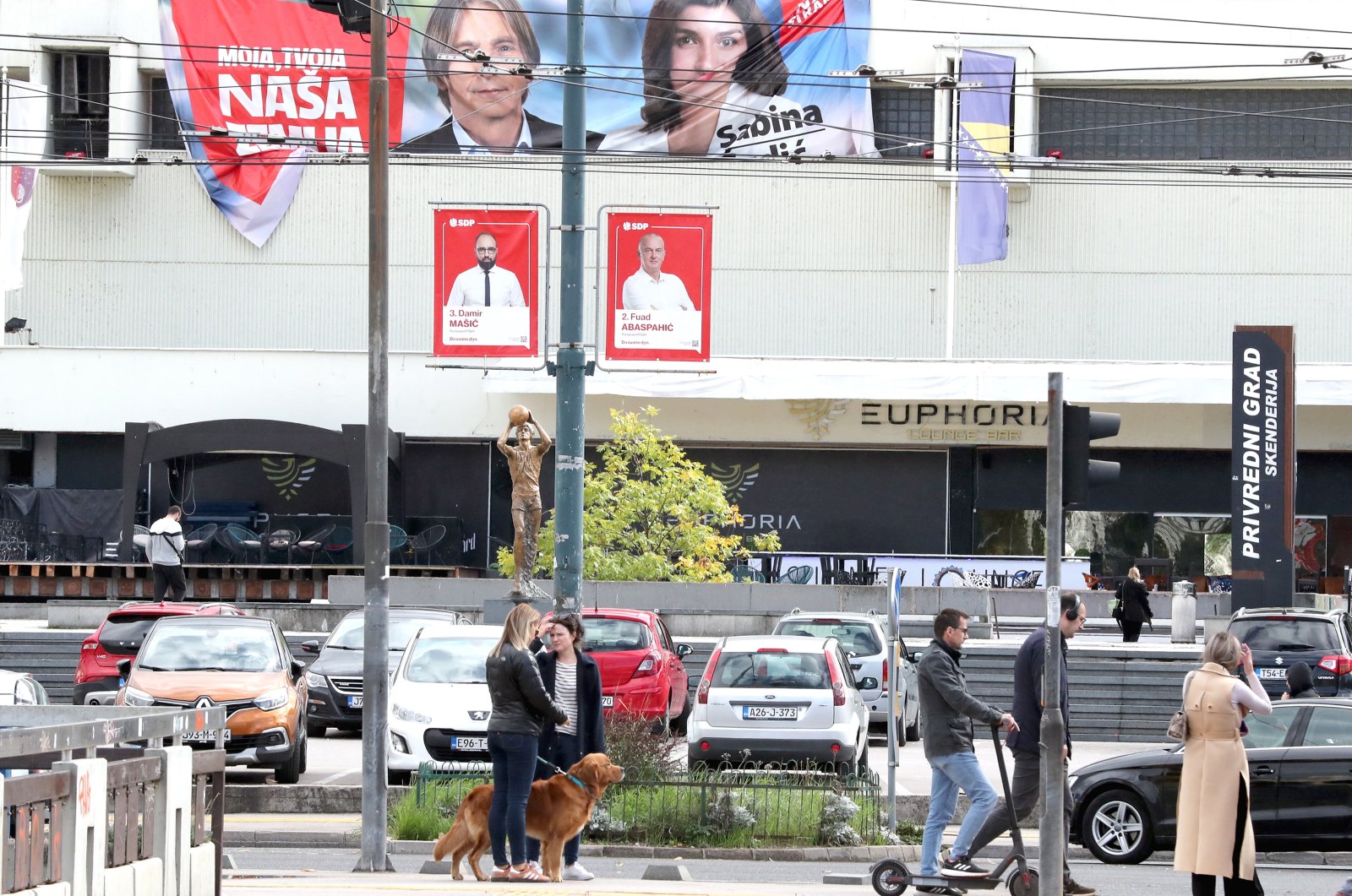People walk past election billboards in Sarajevo, Bosnia-Herzegovina, Oct. 3, 2022. (EPA Photo)