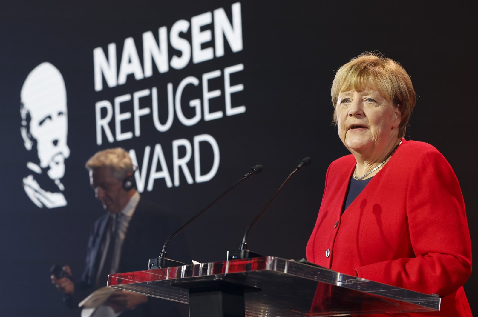 Former Chancellor of Germany Angela Merkel speaks upon receiving the United Nations High Commissioner for Refugees (UNHCR) Nansen Refugee Award for protecting refugees at the height of the Syria crisis during a ceremony in Geneva, Switzerland, Oct. 10, 2022.  (EPA Photo)