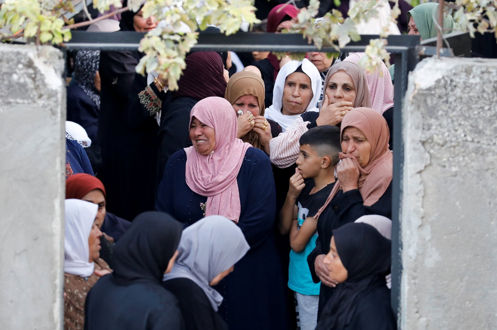 Mourners attend the funeral of Mahmoud Samoudi, 12, who died of a wound he sustained during an Israeli raid in Jenin, in the Israeli-occupied West Bank, Oct. 10, 2022. (Reuters Photo)